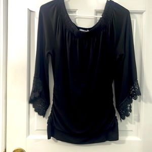 Nygard brand black top. 3/4 “ lace bottom sleeves. In great condition. Petite S